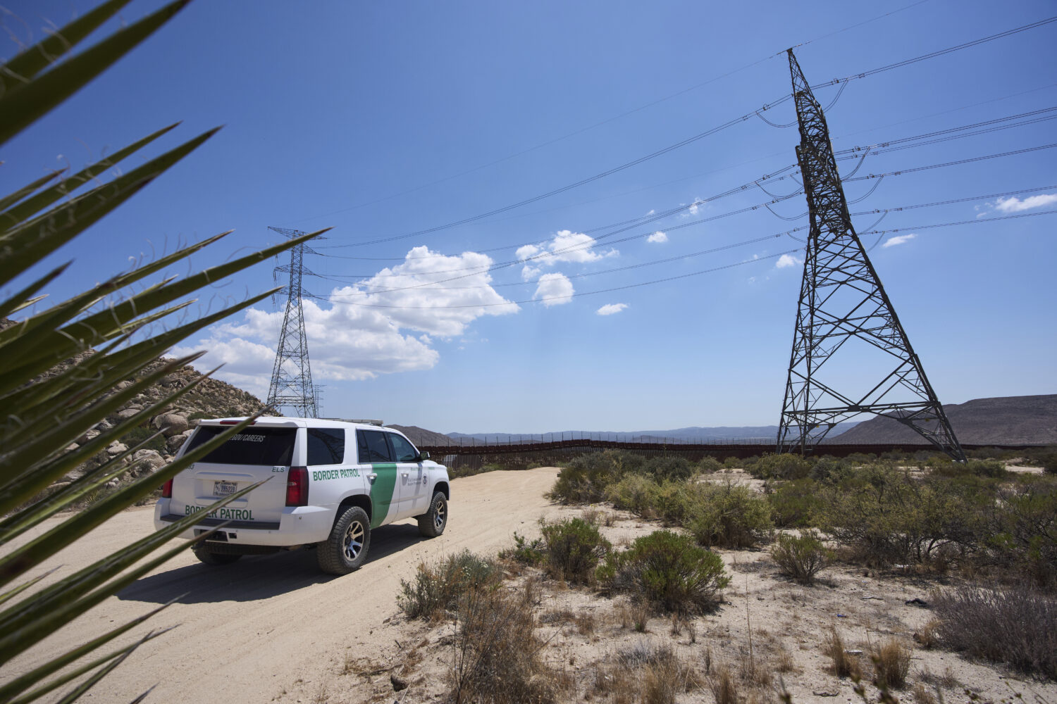 A Border Patrol vehicle sits near where, in years past, volunteers would see hundreds of migrants d...