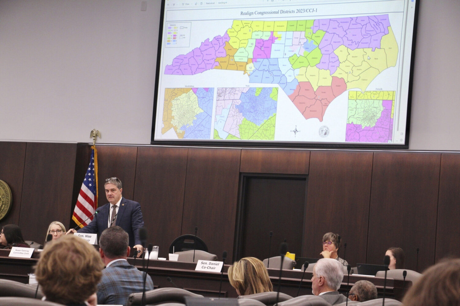 FILE - The North Carolina Senate reviews copies of a map proposal for the state's congressional dis...