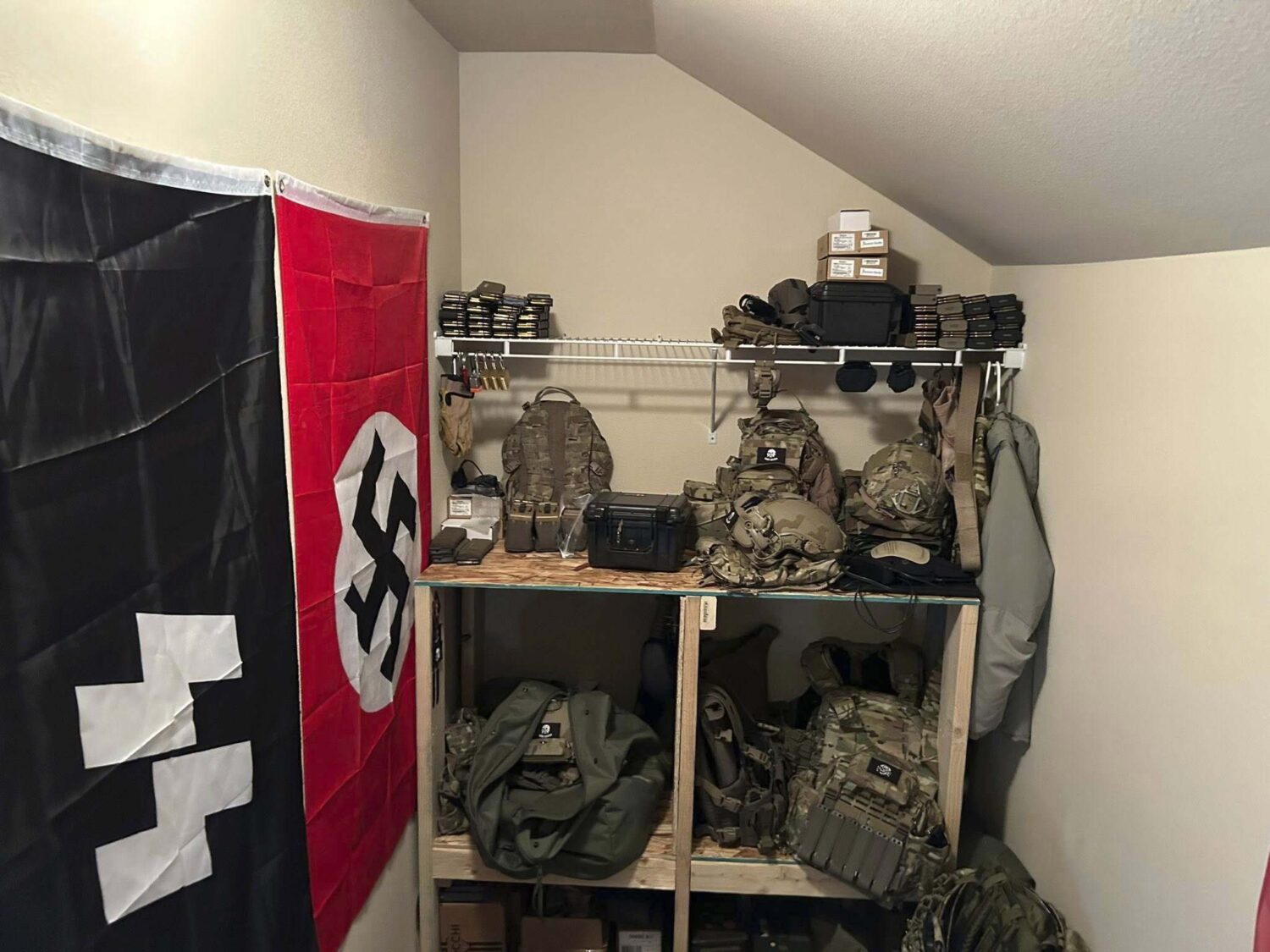 In this undated photo released by the Thurston County Sheriff's Office, a cache of military weaponr...