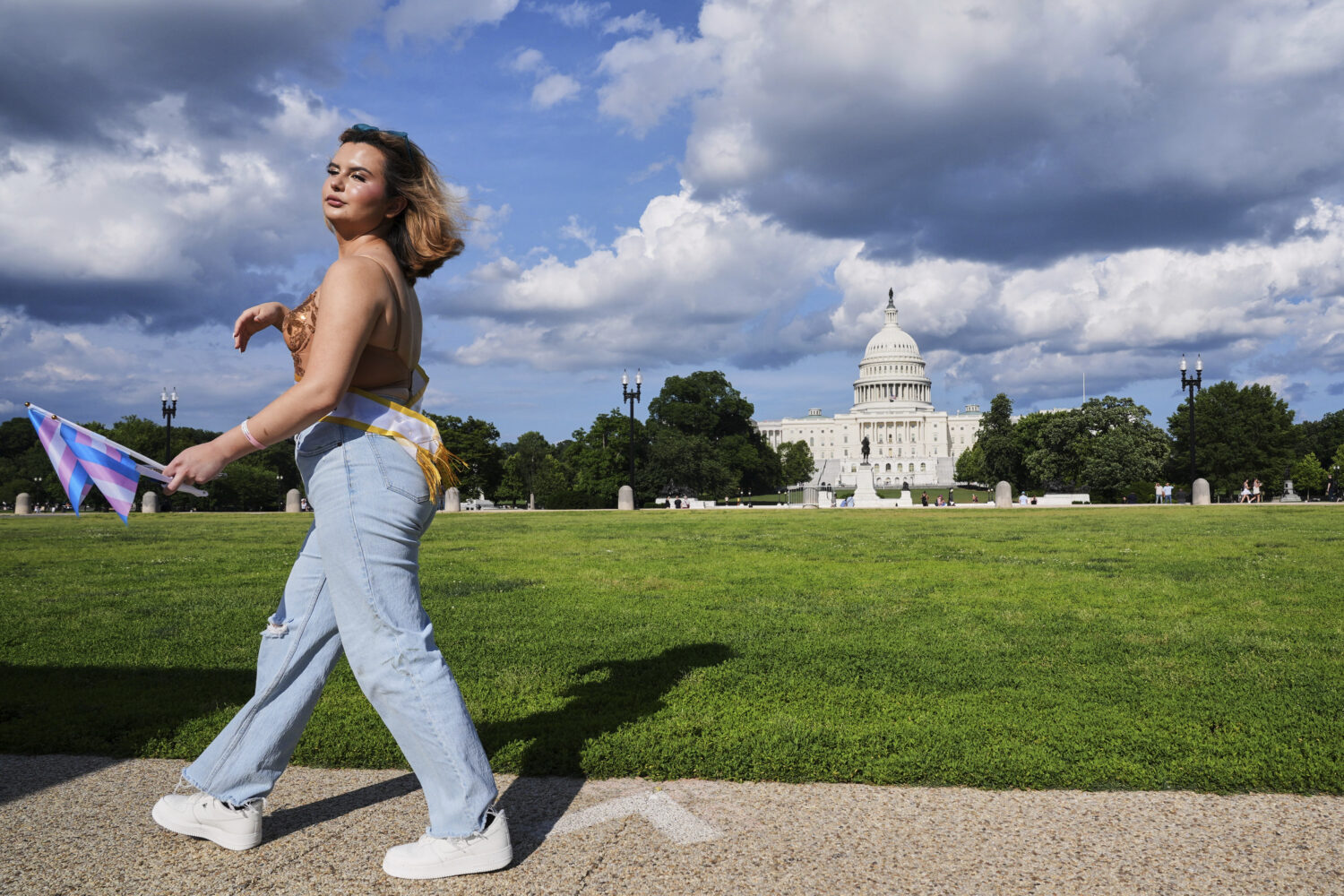 Bella Bautista, 22, a trans woman from Cartersville, Ga., walks past the U.S. Capitol after attendi...