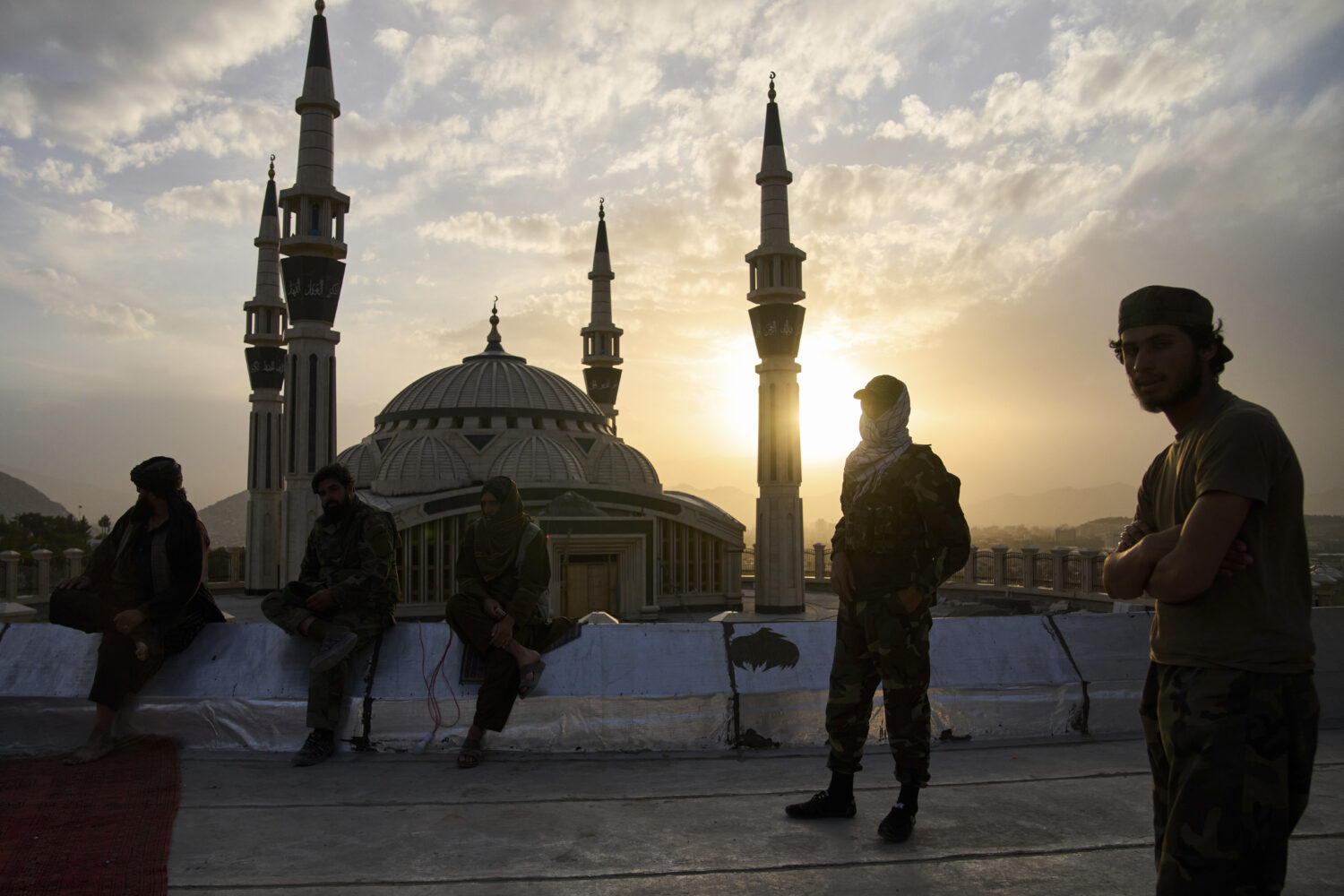 Taliban fighters stand guard on Nadir Khan hill in Kabul, Afghanistan, Tuesday, June 10, 2025. (AP ...