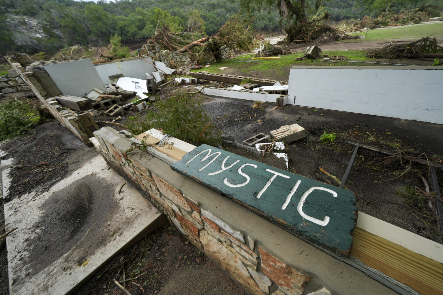 A Camp Mystic sign is seen near the entrance to the establishment along the banks of the Guadalupe ...