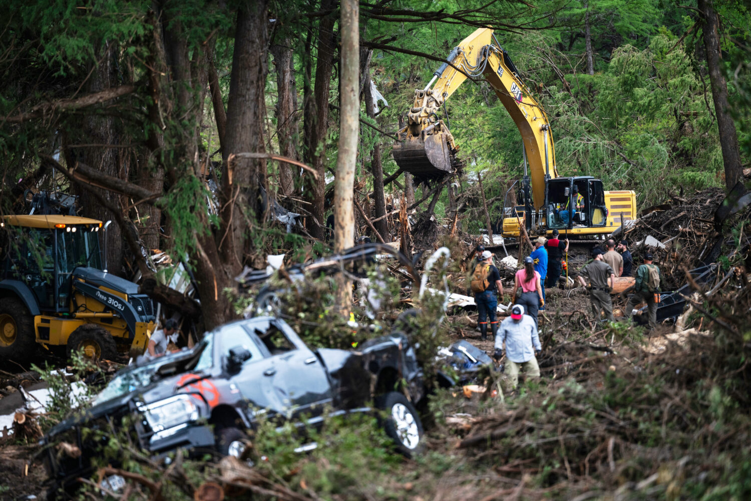 First responders carry out search and rescue operations near the Guadalupe River after a flash floo...