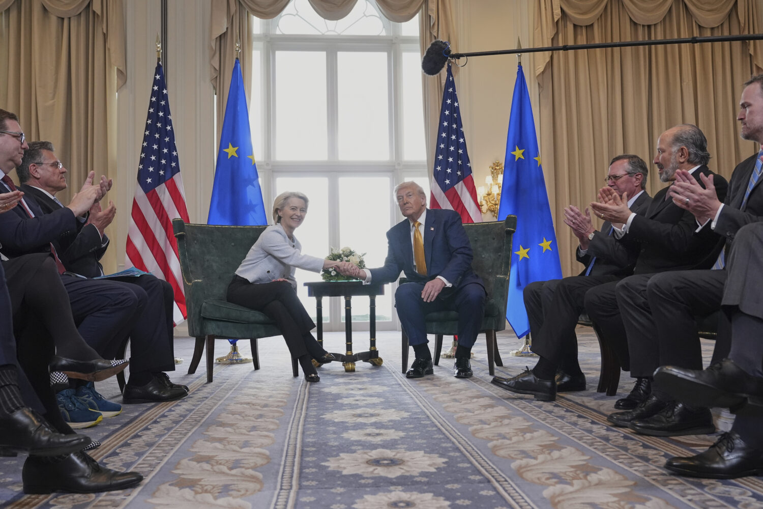 President Donald Trump and European Commission President Ursula von der Leyen shake hands after rea...