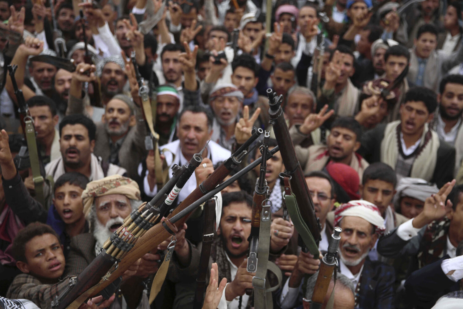 Houthi supporters shout slogans during a weekly, anti-U.S. and anti-Israel rally in Sanaa, Yemen, F...