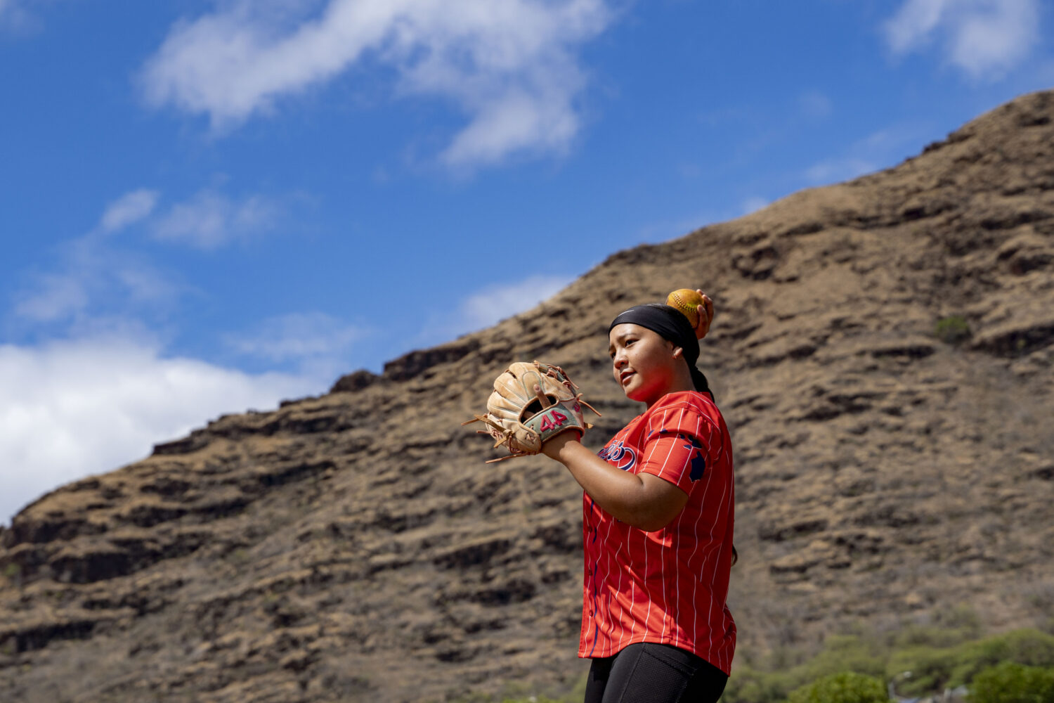 Ry-n Uyeda warms up during a softball practice, Friday, July 11, 2025, in Waianae, Hawaii. (AP Phot...