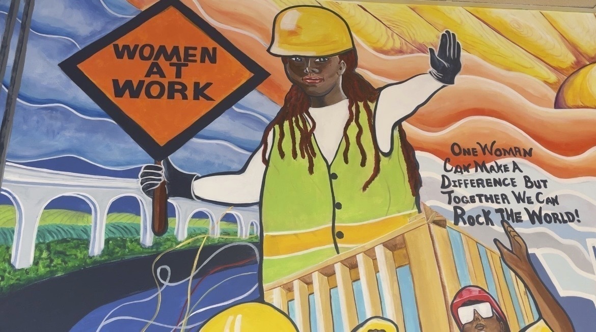 FILE - A mural by artist Tene Smith is seen near the entrance of Chicago Women in Trades, a nonprof...