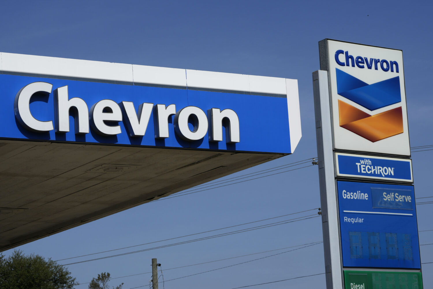 File - Chevron logos are displayed at a gas station in Columbus, Miss., Monday, Oct. 23, 2023.(AP P...