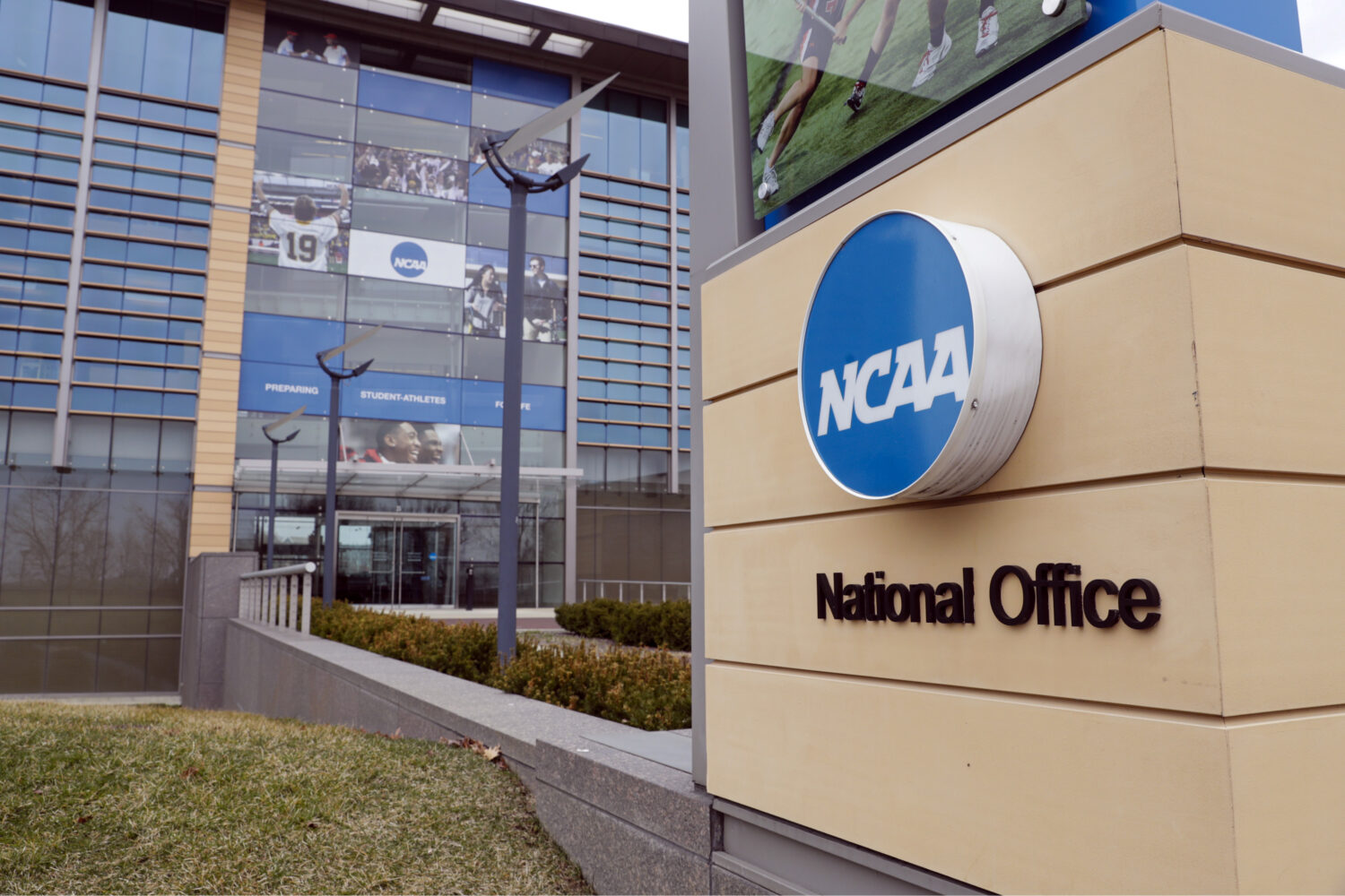 FILE - The national office of the NCAA in Indianapolis is shown on March 12, 2020. (AP Photo/Michae...