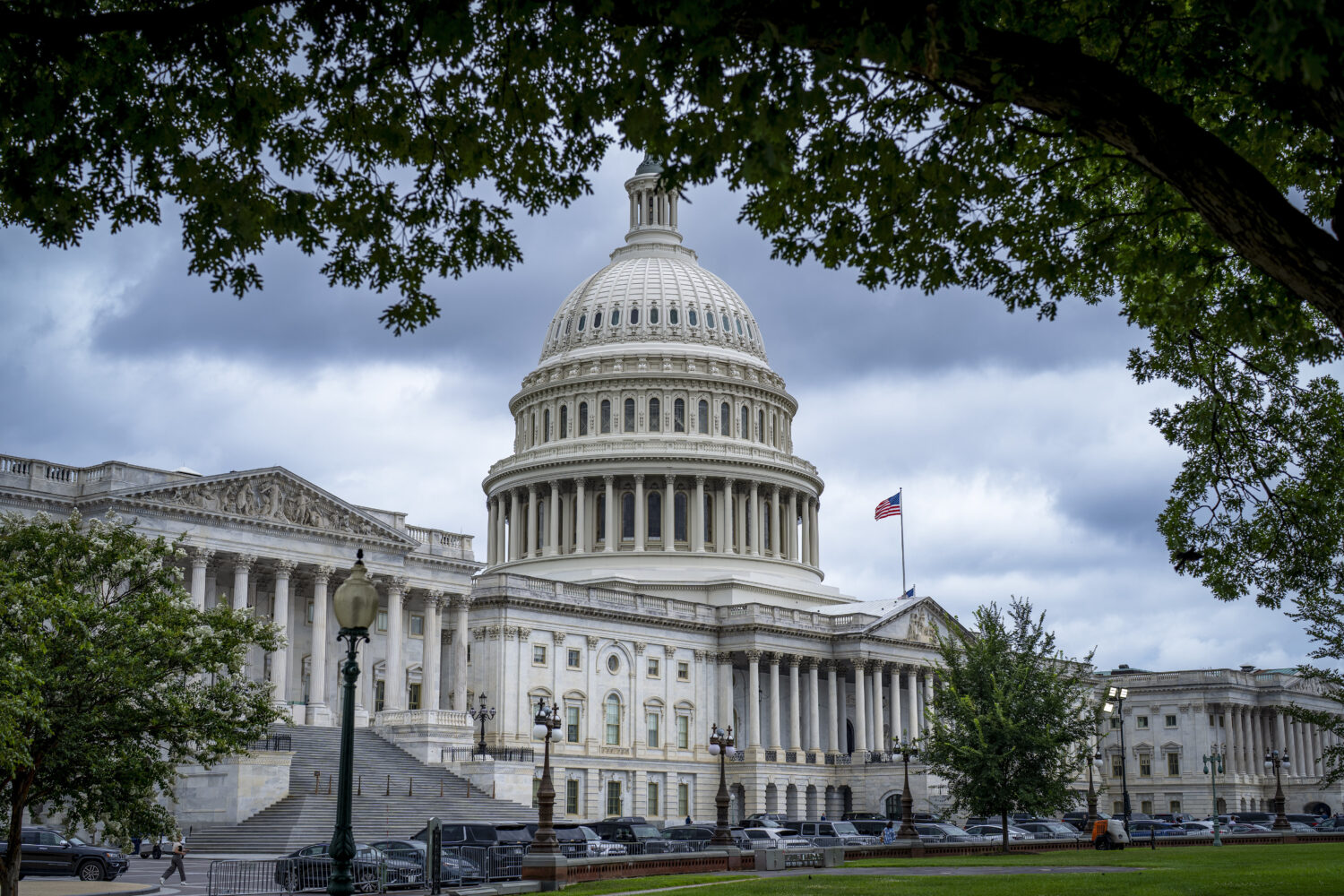 The Capitol is seen under dark skies in Washington, Tuesday, July 15, 2025. (AP Photo/J. Scott Appl...