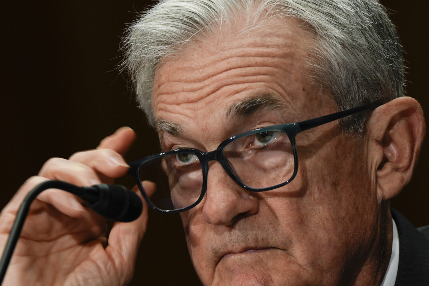 FILE - Federal Reserve Board Chairman Jerome Powell listens during a Senate Committee on Banking he...