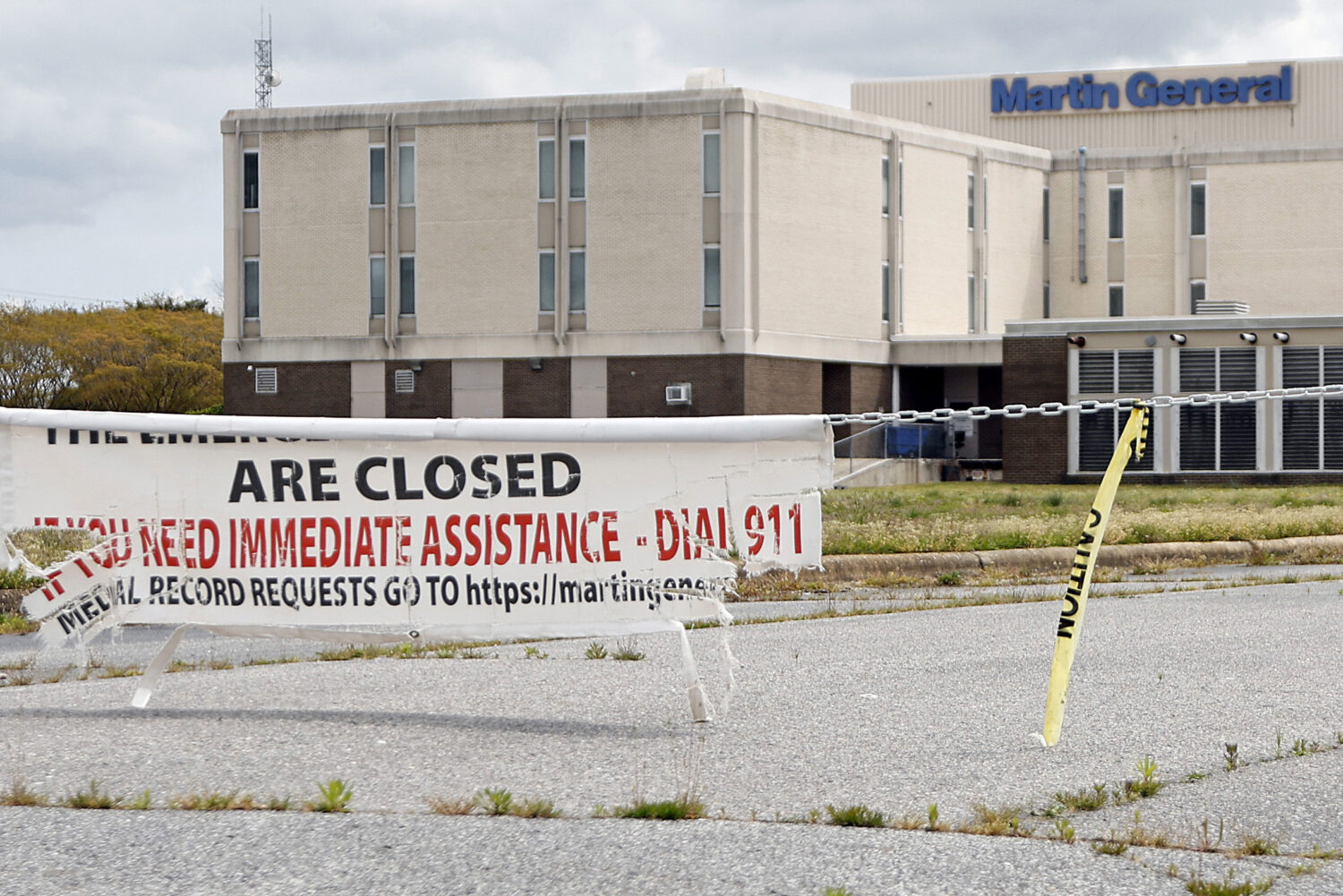 FILE - The vacant Martin County General Hospital sits abandoned behind a chain since being closed i...