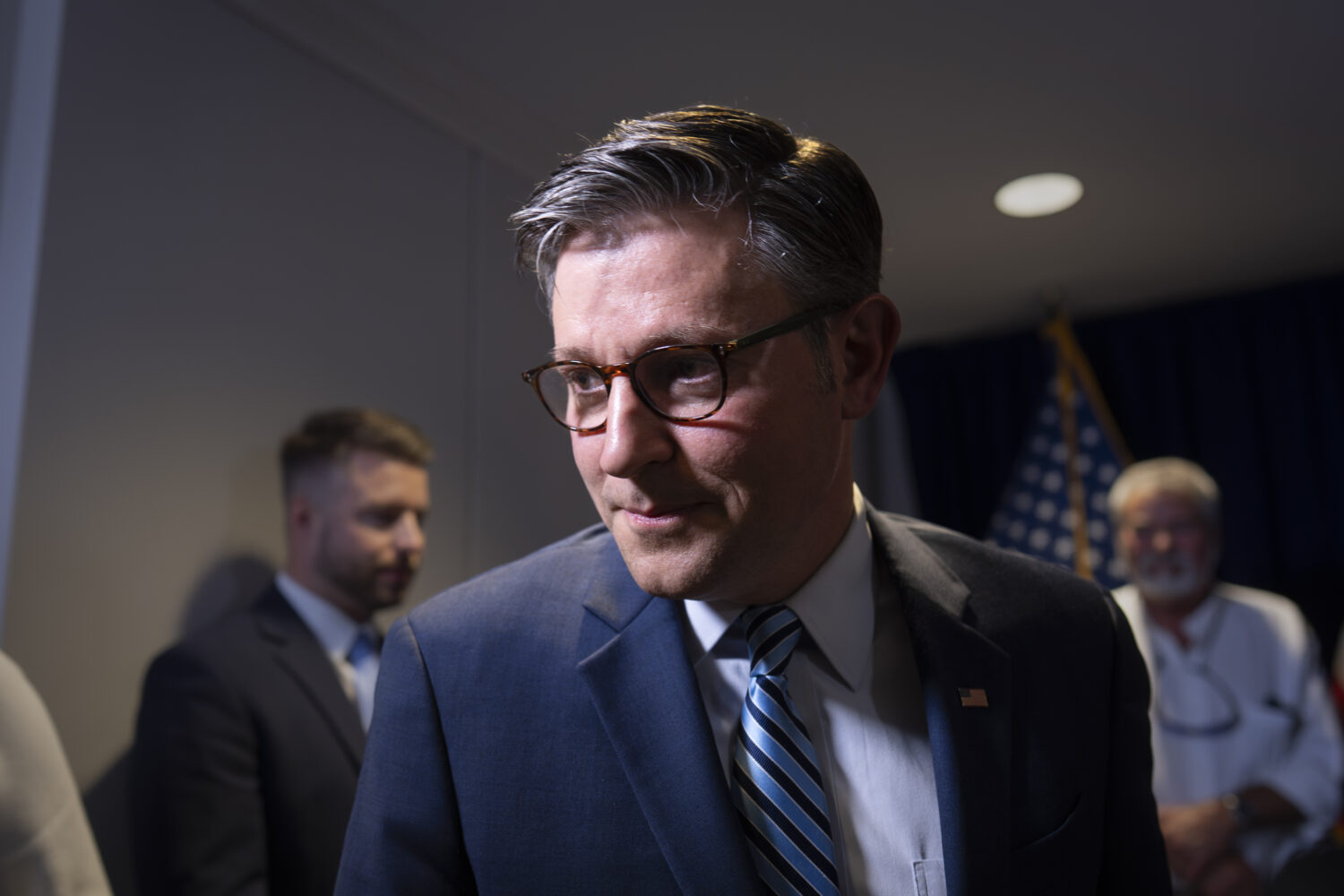 Speaker of the House Mike Johnson, R-La., departs a news conference at the Republican National Comm...