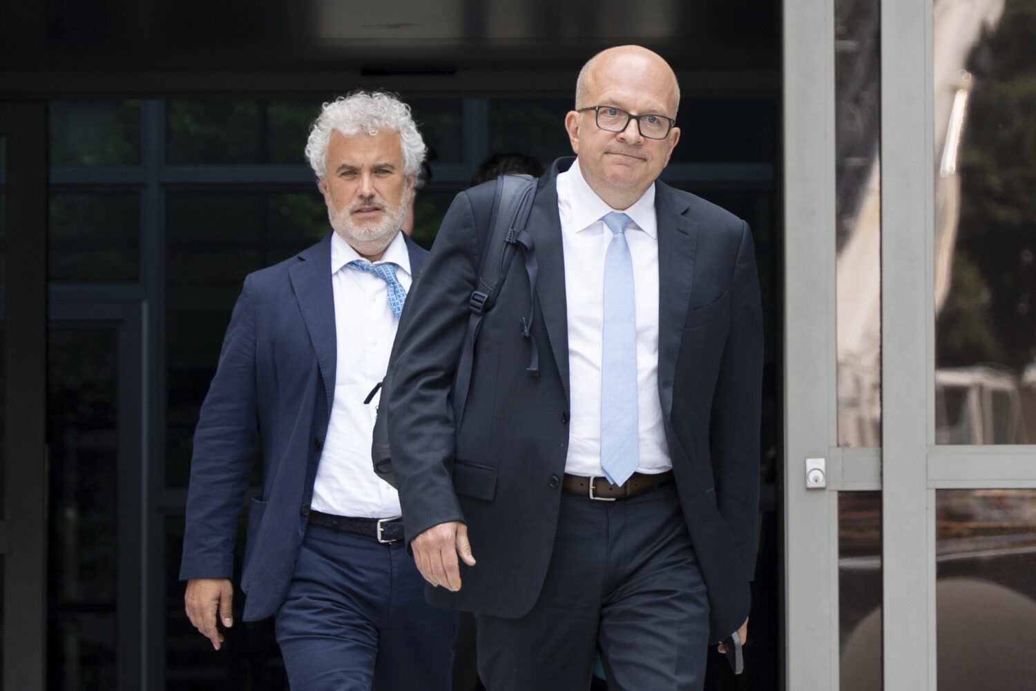 Former Meta board member and former White House Chief of Staff Jeffrey Zients, left, exits the Leon...