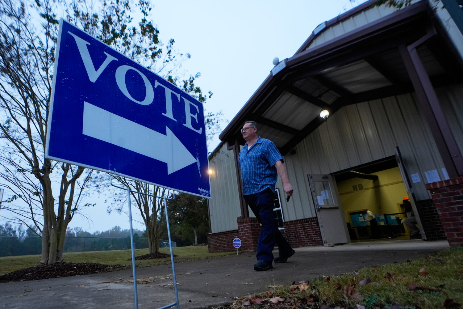 FILE - A voter leaves a polling location after voting Tuesday, Nov. 5, 2024, in Rutledge, Ga. (AP P...