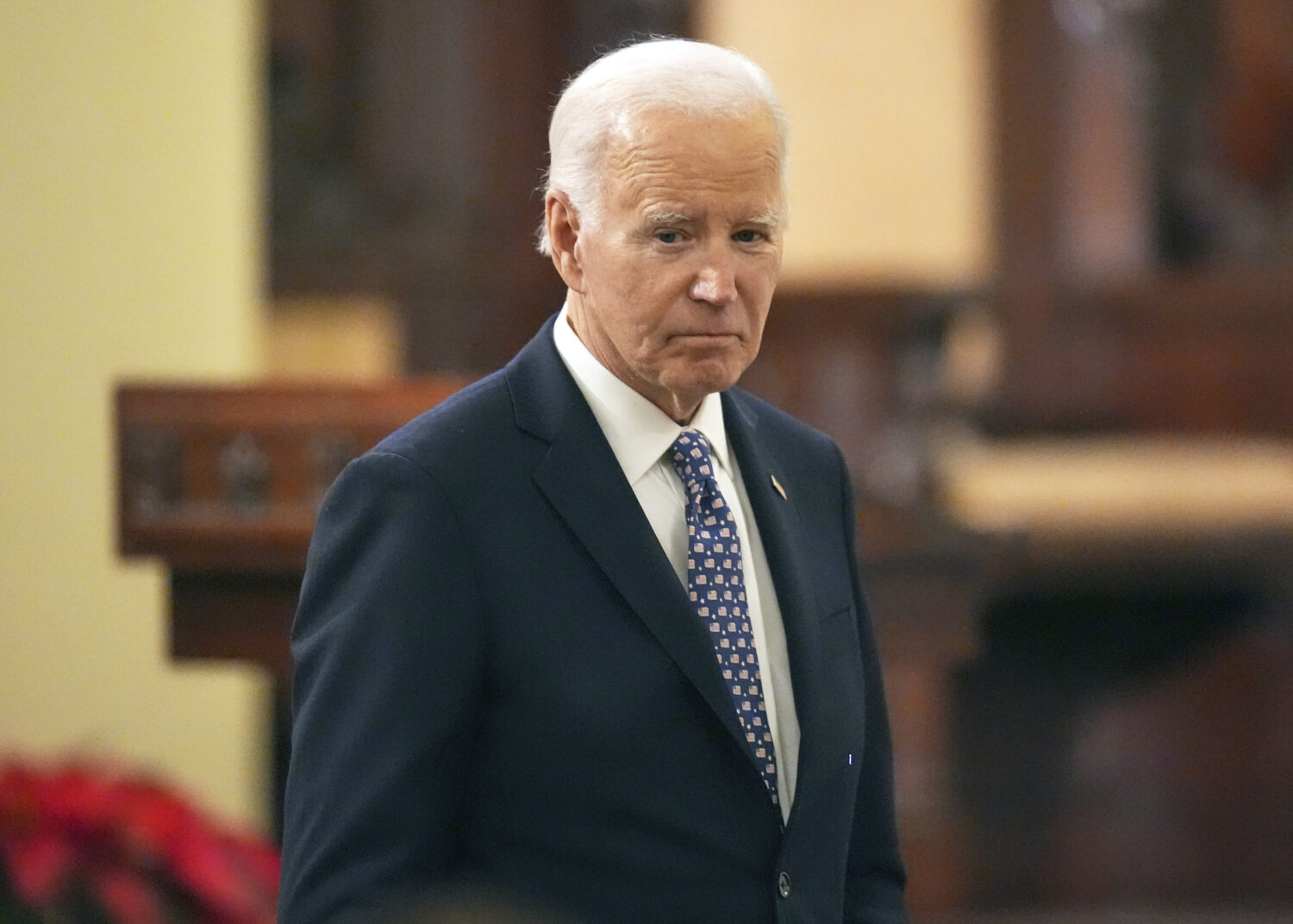 FILE - President Joe Biden walks after speaking during an interfaith prayer service in New Orleans,...