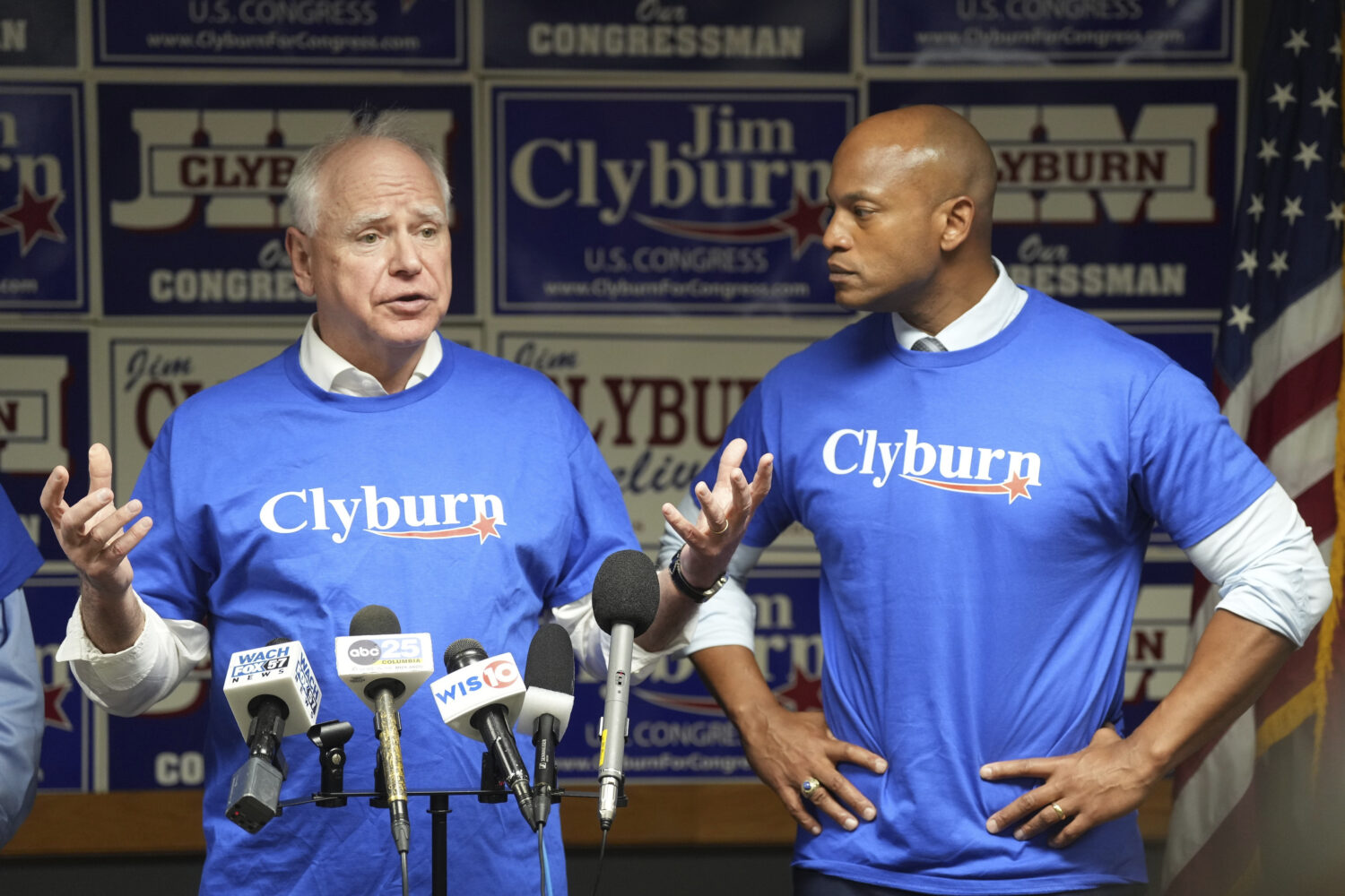 FILE - Minnesota Gov. Tim Walz, left, speaks to reporters as Maryland Gov. Wes Moore looks on at Re...