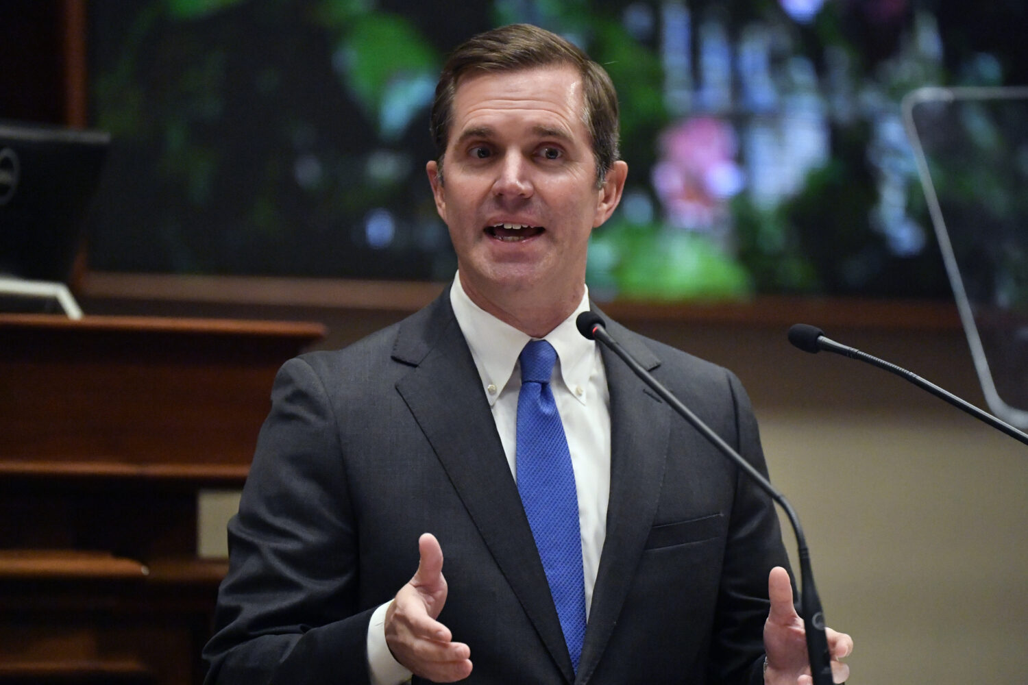 FILE - Kentucky Gov. Andy Beshear delivers his State of The Commonwealth address in the House chamb...