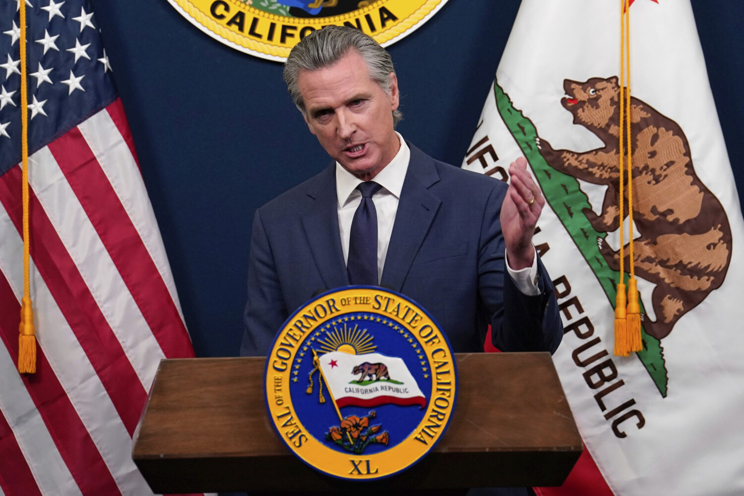 FILE - Calif. Gov. Gavin Newsom presents his revised 2025-2026 state budget during a news conferenc...