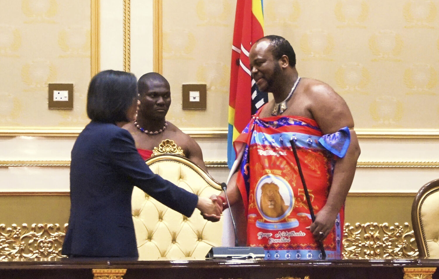 FILE - Taiwan's President Tsai Ing-wen, left, shakes hands with Eswatini's King Mswati III at the r...