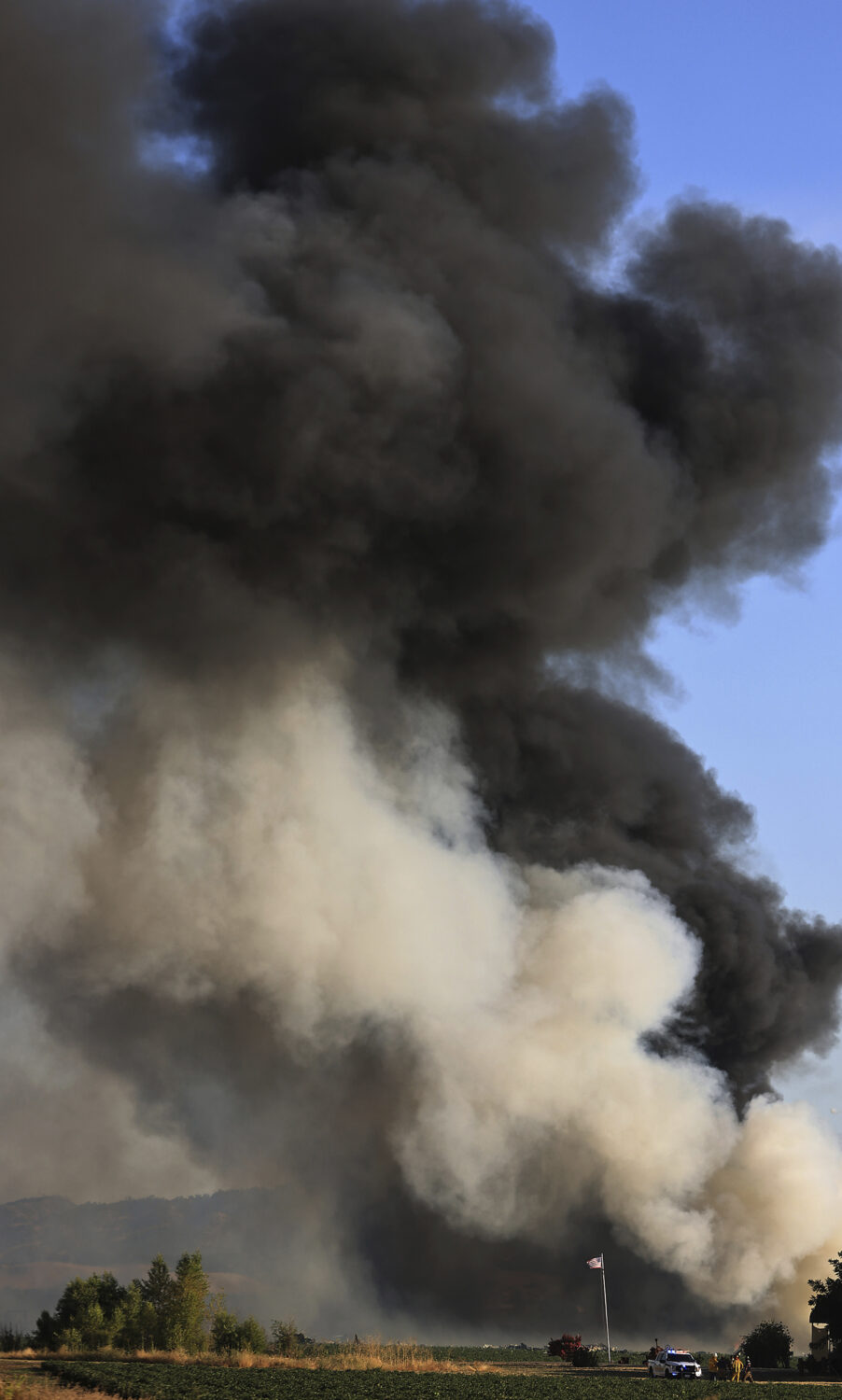 FILE - Smoke and flames rise during a fireworks warehouse explosion near Esparto, Calif., Tuesday, ...