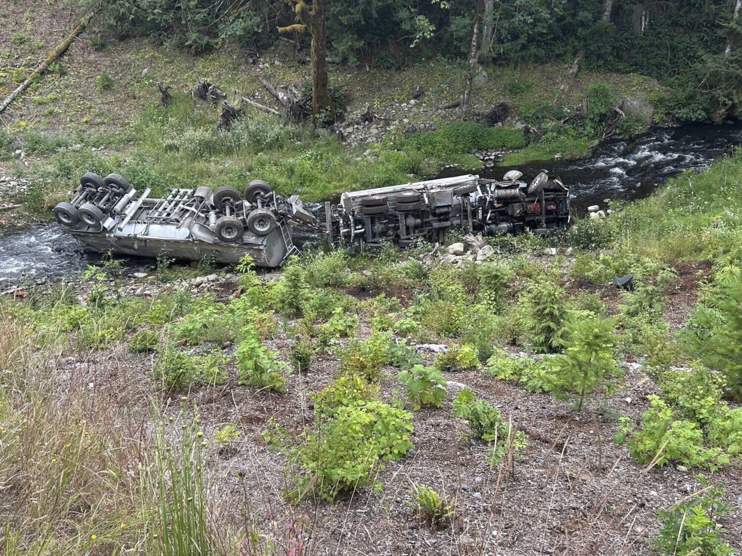 This photo provided by the Washington State Department of Transportation shows a tanker truck that ...