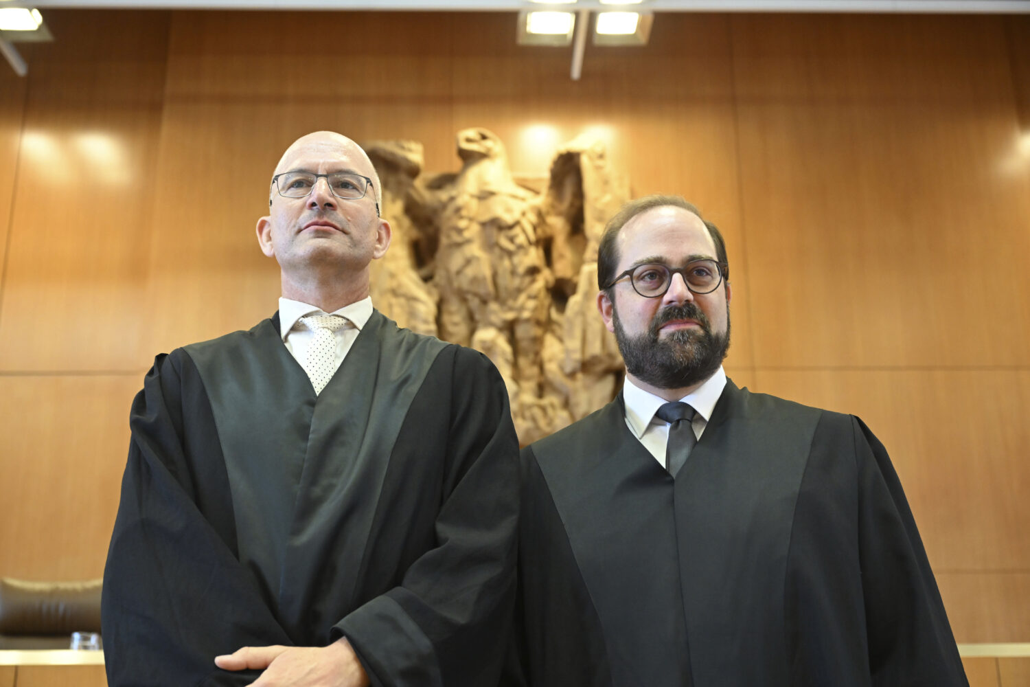 Andreas Schueller, right, and Soenke Hilbrans, lawyers representing the complainants in the proceed...