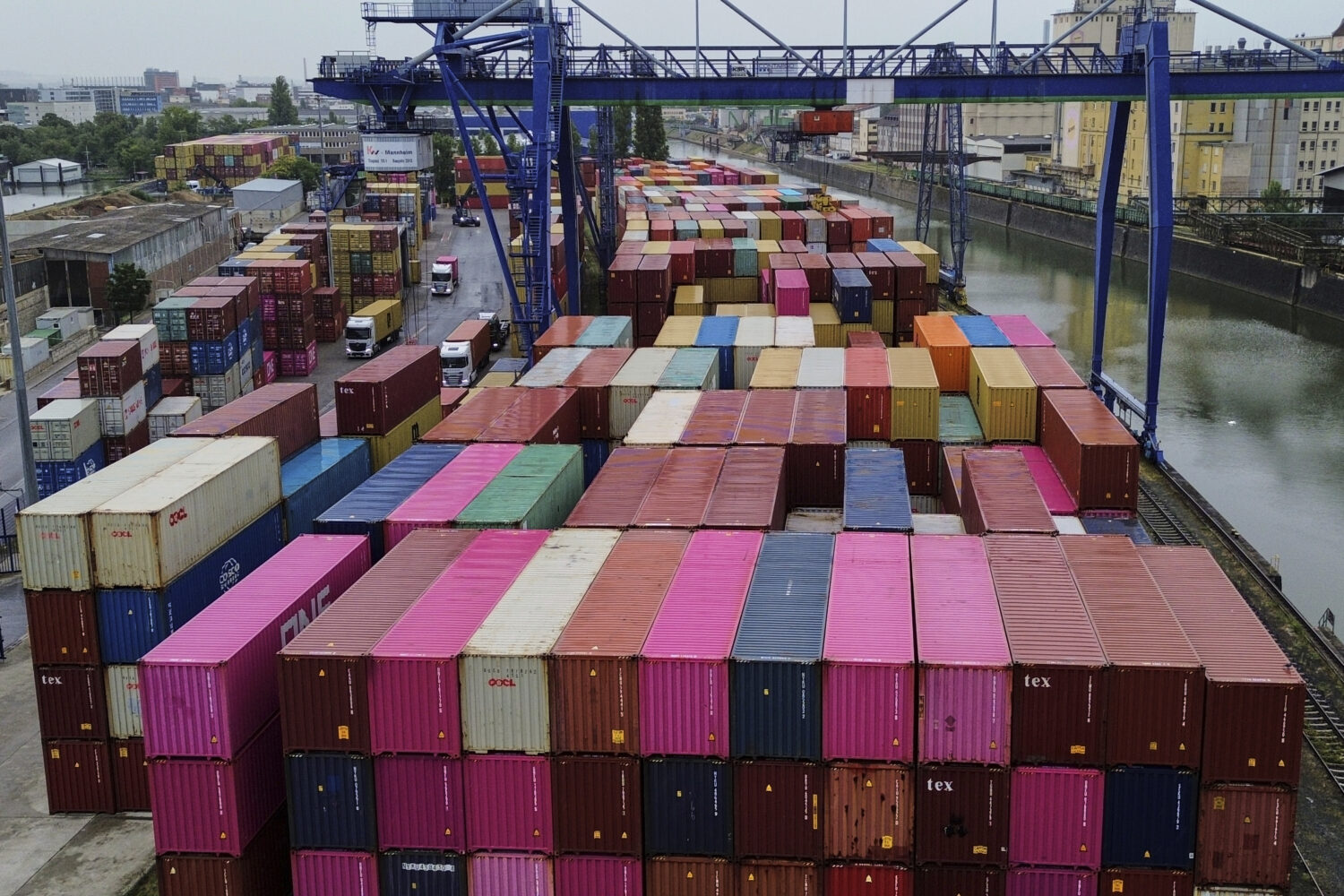 Containers are piled up at a cargo terminal in Frankfurt, Germany, Wednesday, July 16, 2025. (AP Ph...