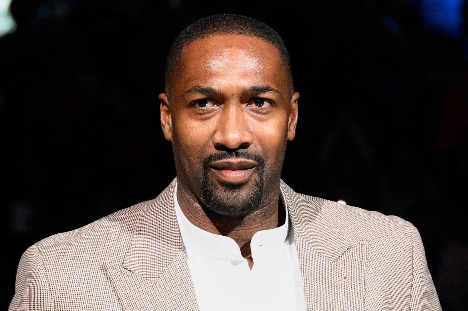 FILE - Former Washington Wizards player Gilbert Arenas takes part in a ceremony during the half-tim...