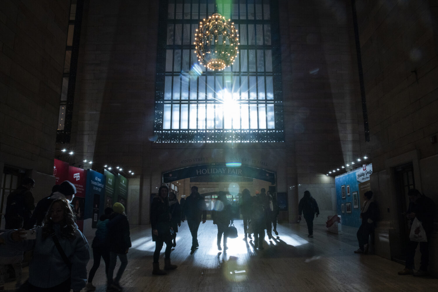 FILE - Travelers walk through Grand Central Terminal in New York on Dec. 21, 2023. (AP Photo/Eduard...