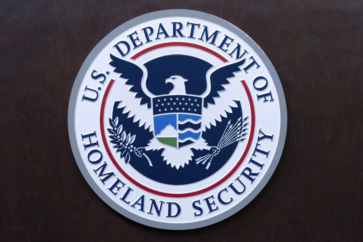 FILE - The seal of U.S. Department of Homeland Security is seen before the news conference with Act...