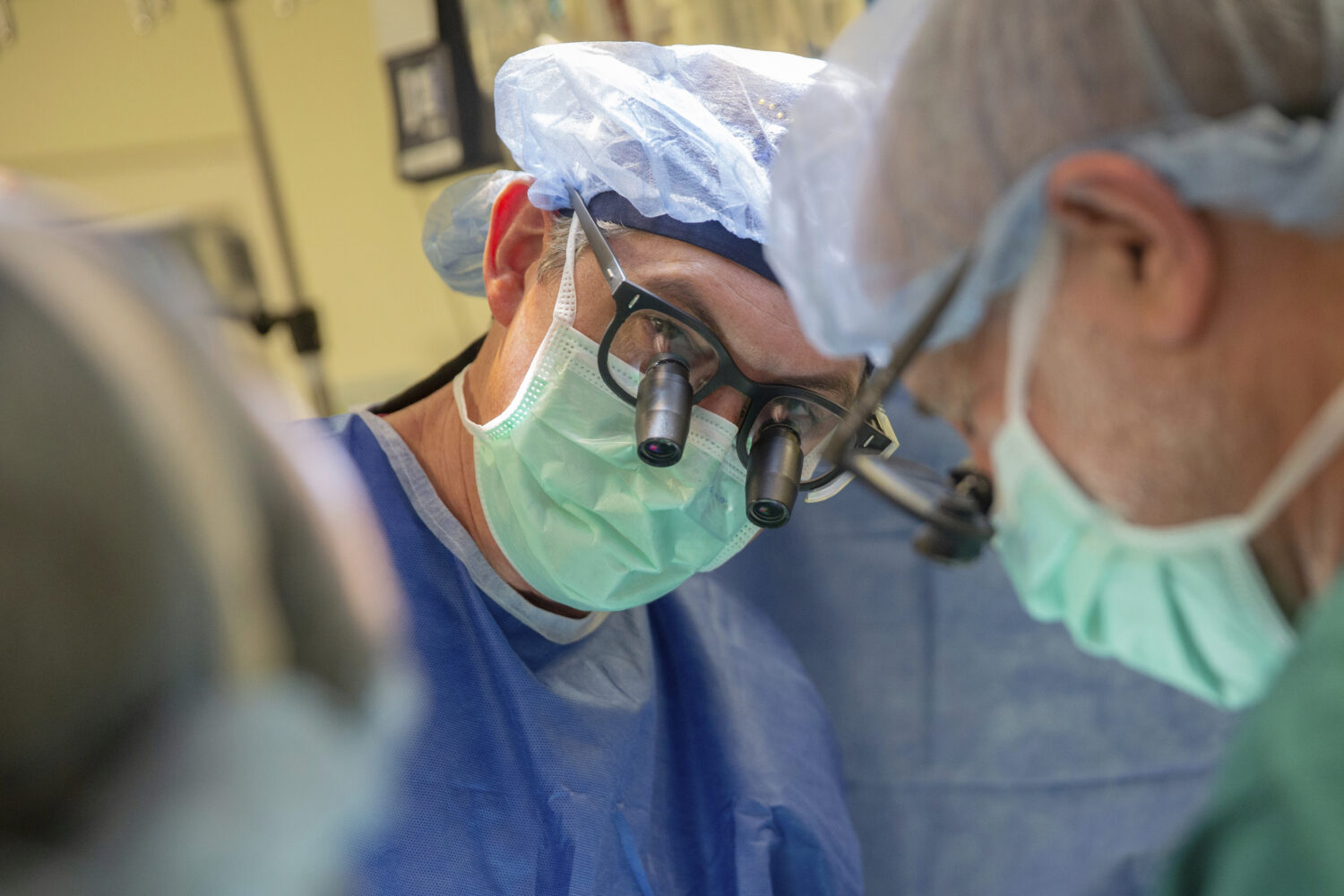 This photo provided by DukeHealth shows surgeon Joseph Turek during pediatric heart surgery in Durh...