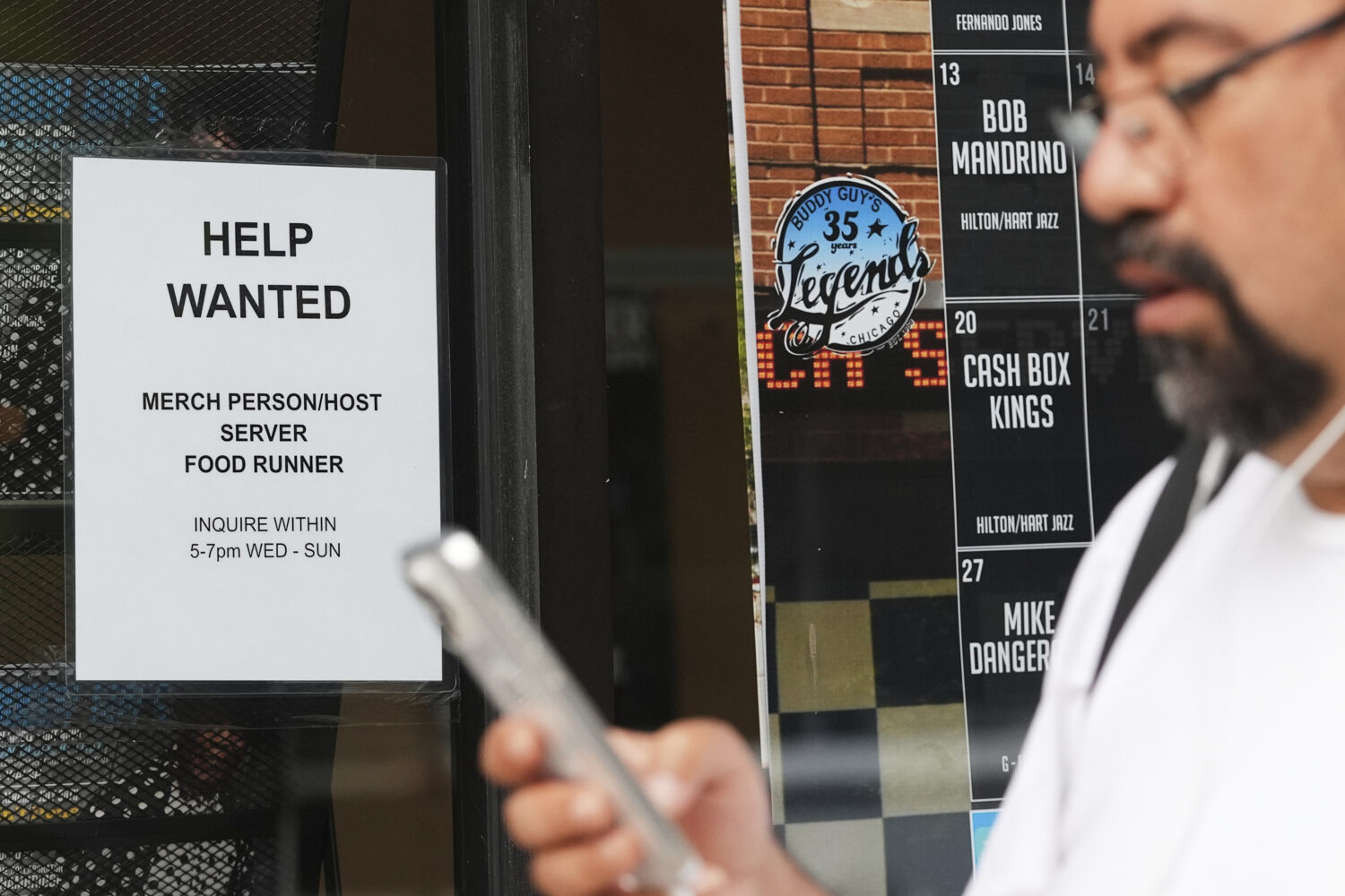 Help wanted sign is displayed at a live music and blues club in Chicago, Thursday, July 24, 2025. (...