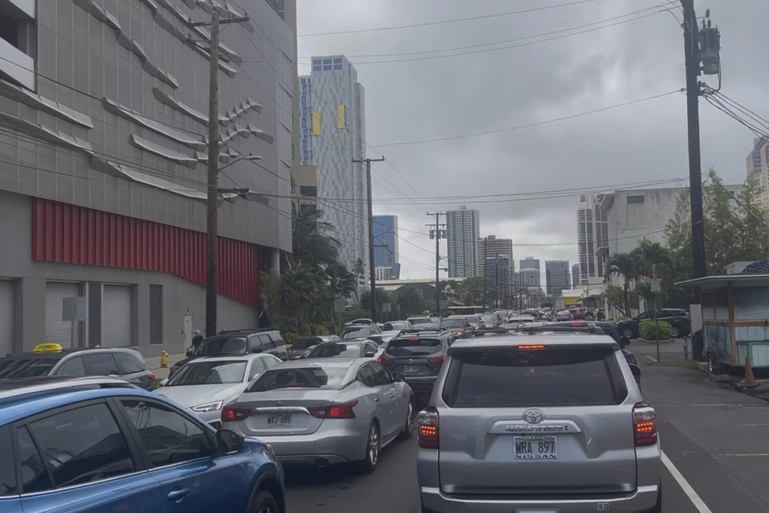 A traffic jam forms in Honolulu Tuesday, July 29, 2025 as people heed a tsunami evacuation warning ...