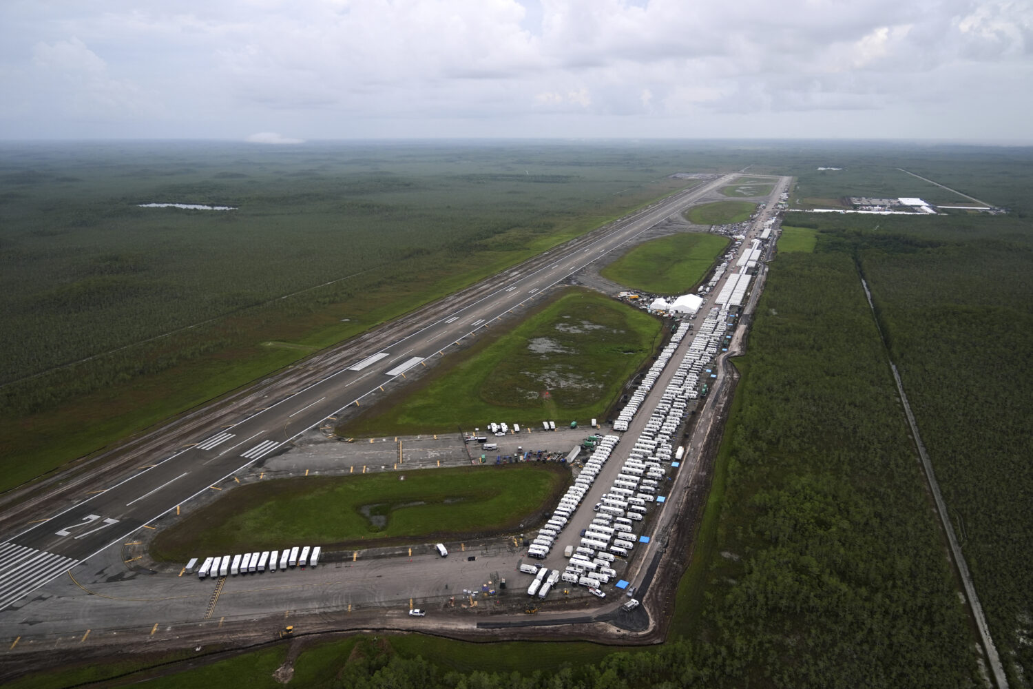 Work progresses on a new migrant detention facility dubbed "Alligator Alcatraz," at Dade-Collier Tr...