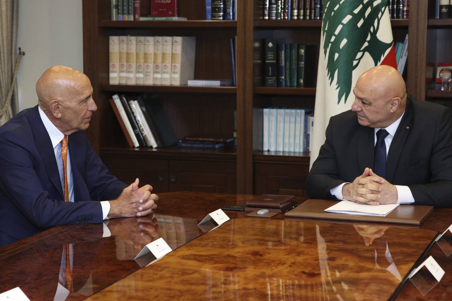 In this photo released by the Lebanese Presidency press office, Lebanese president Joseph Aoun, rig...