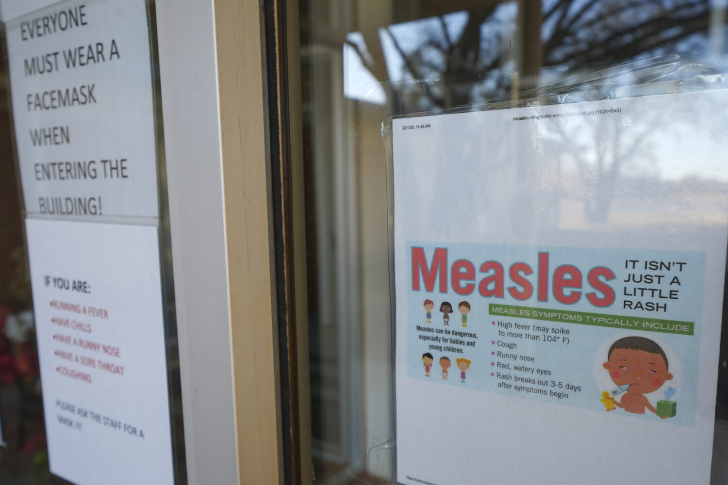FILE - A sign is seen outside a clinic with the South Plains Public Health District, Feb. 23, 2025,...