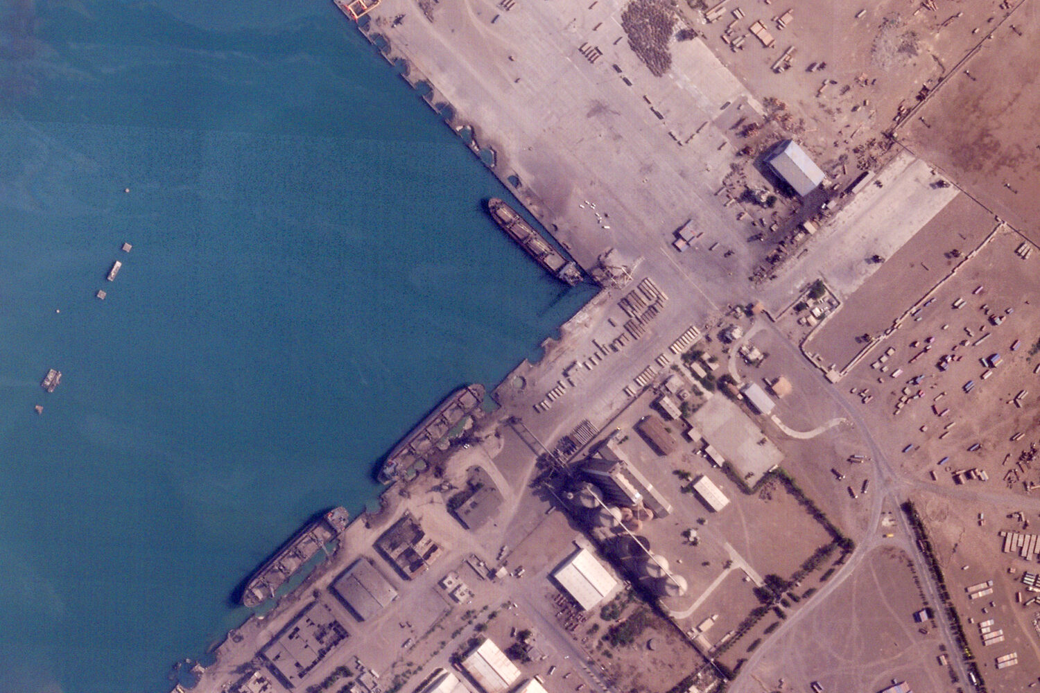Damage is seen after Israeli airstrikes targeted the port in Hodeida, Yemen, Tuesday, July 8, 2025....