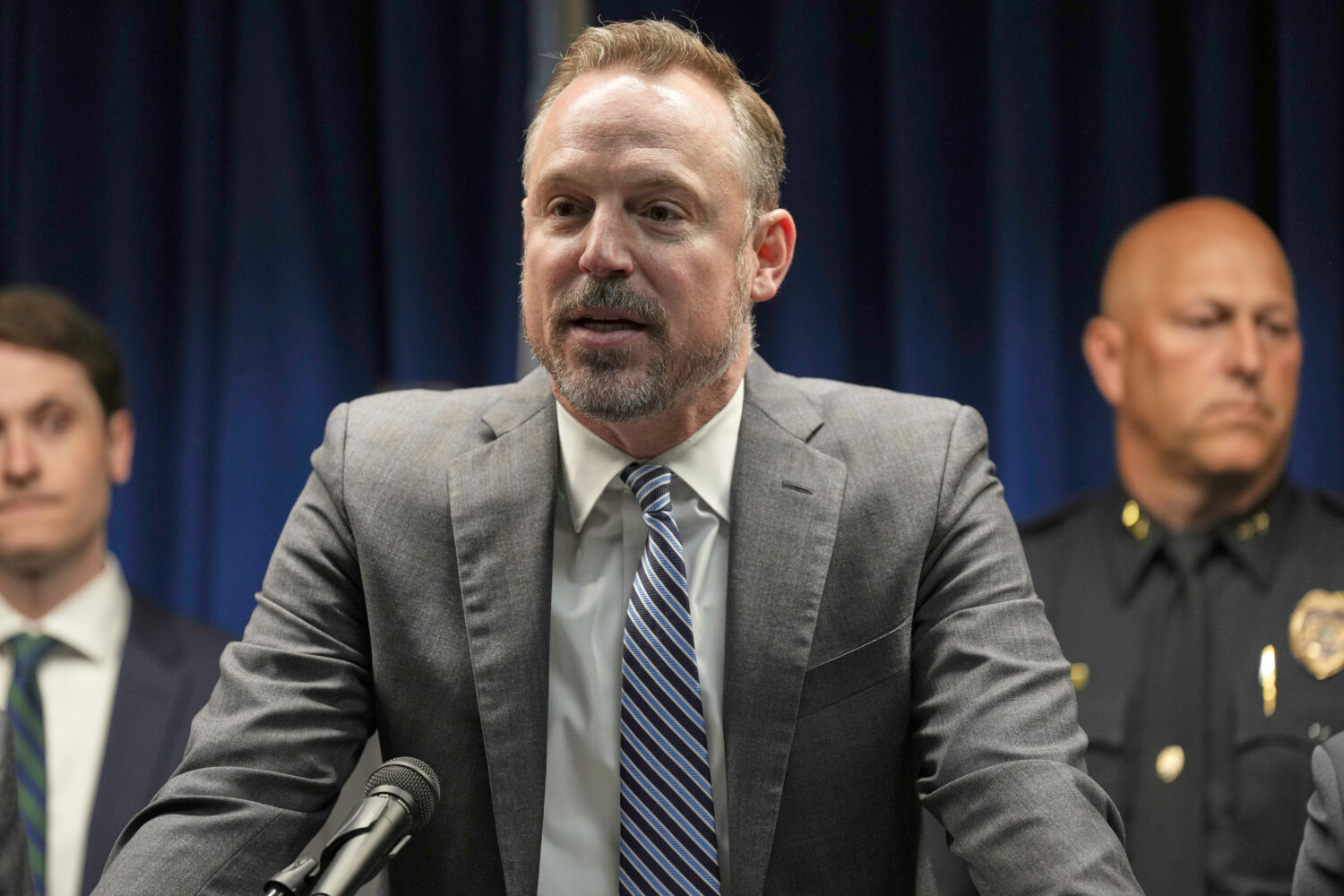 Acting U.S. Attorney Joseph H. Thompson speaks during a news conference at the United States Courth...