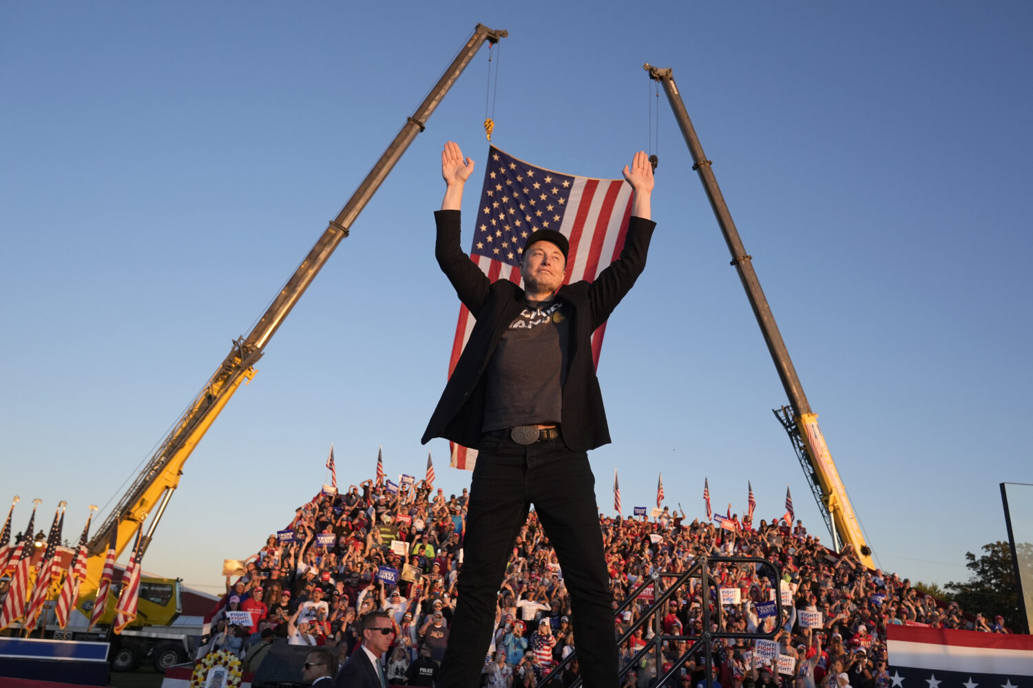 FILE - Tesla and SpaceX CEO Elon Musk walks to the stage to speak at the Butler Farm Show, Oct. 5, ...