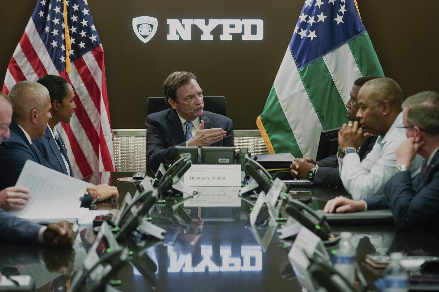 This image provided by Office of the New York Mayor shows Thomas Donlon, center, as New York City's...