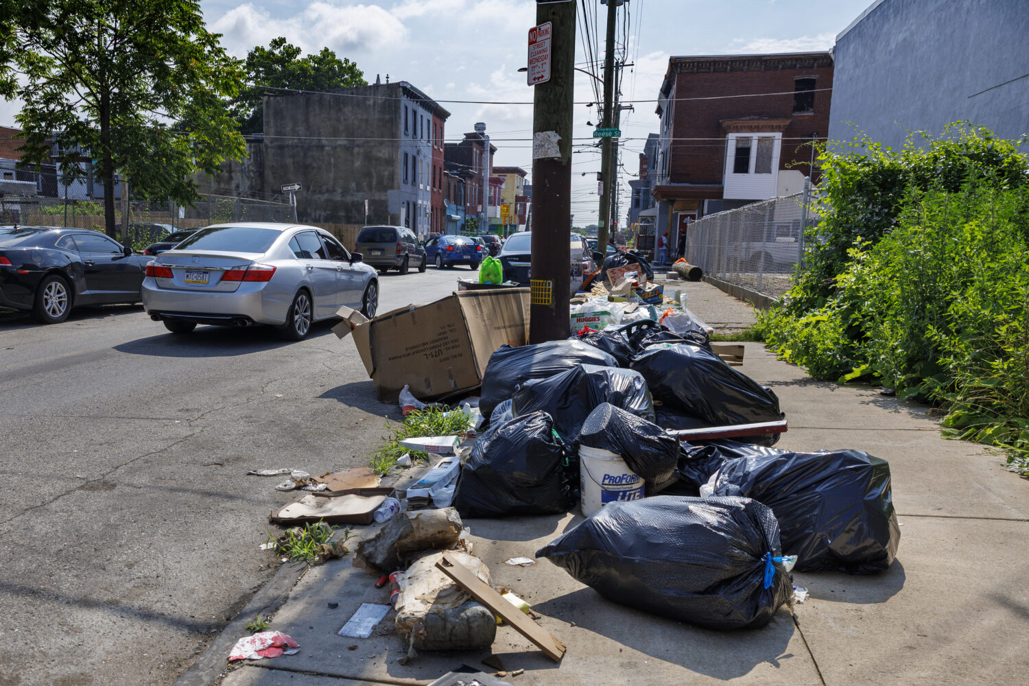 Trash sits on sidewalk along Cumberland and Fairhill Street on Tuesday, July 1, 2025 in Philadelphi...
