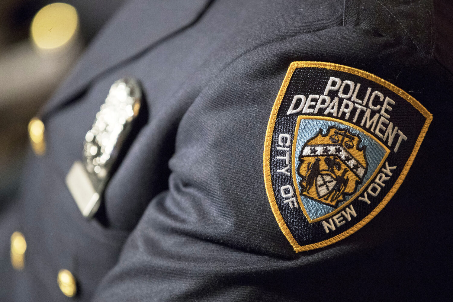 FILE - A badge of the New York City police is seen, June 29, 2017, in New York. (AP Photo/Mary Alta...
