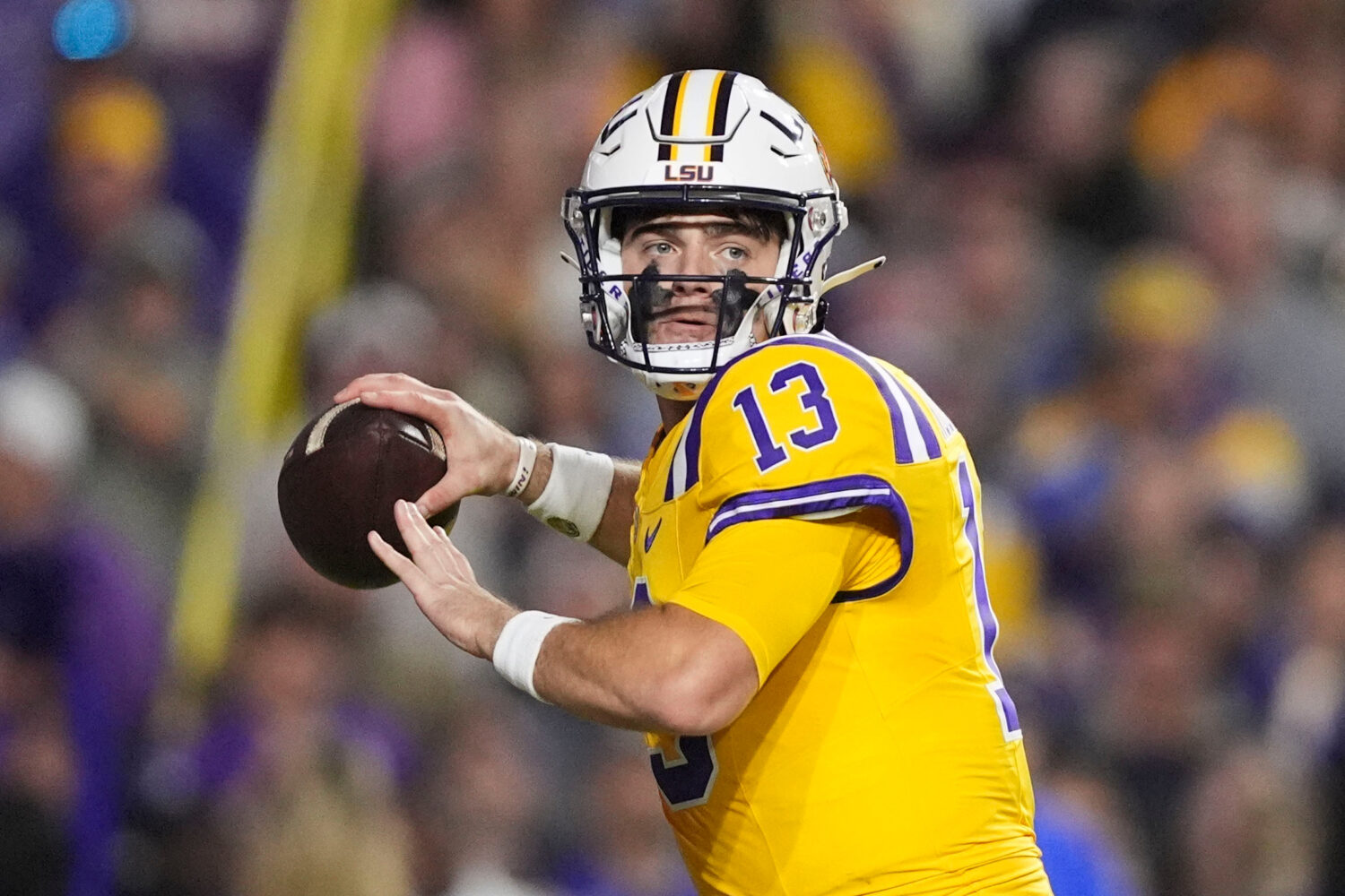 FILE - LSU quarterback Garrett Nussmeier (13) passes in the first half of an NCAA college football ...