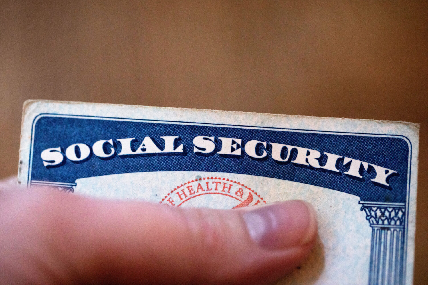 FILE - A Social Security card is displayed on Oct. 12, 2021, in Tigard, Ore. The go-broke dates for...