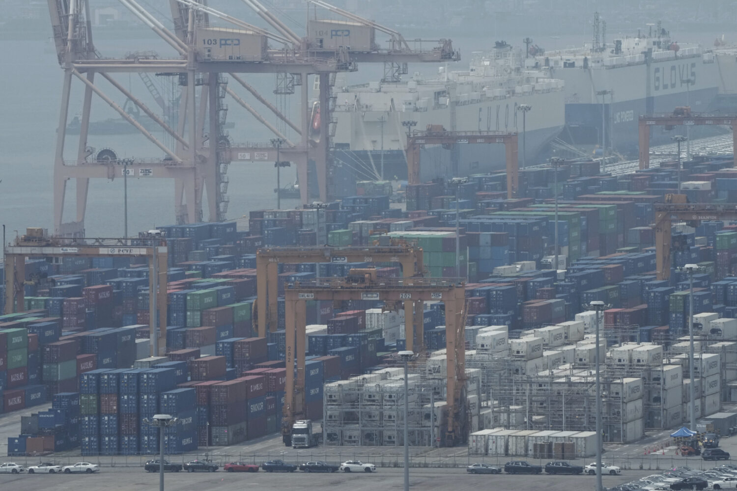 Cranes and shipping containers are seen at a port in Pyeongtaek, South Korea, Tuesday, July 8, 2025...