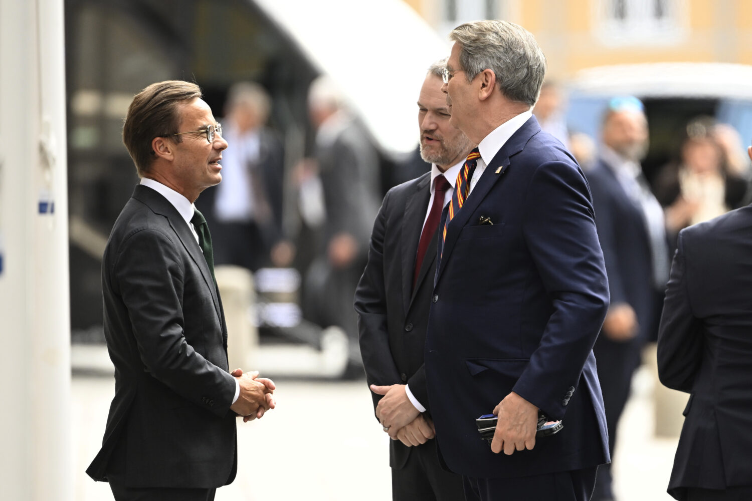Swedens prime minister Ulf Kristersson, left, greets US treasury secretary Scott Bessent, right, an...