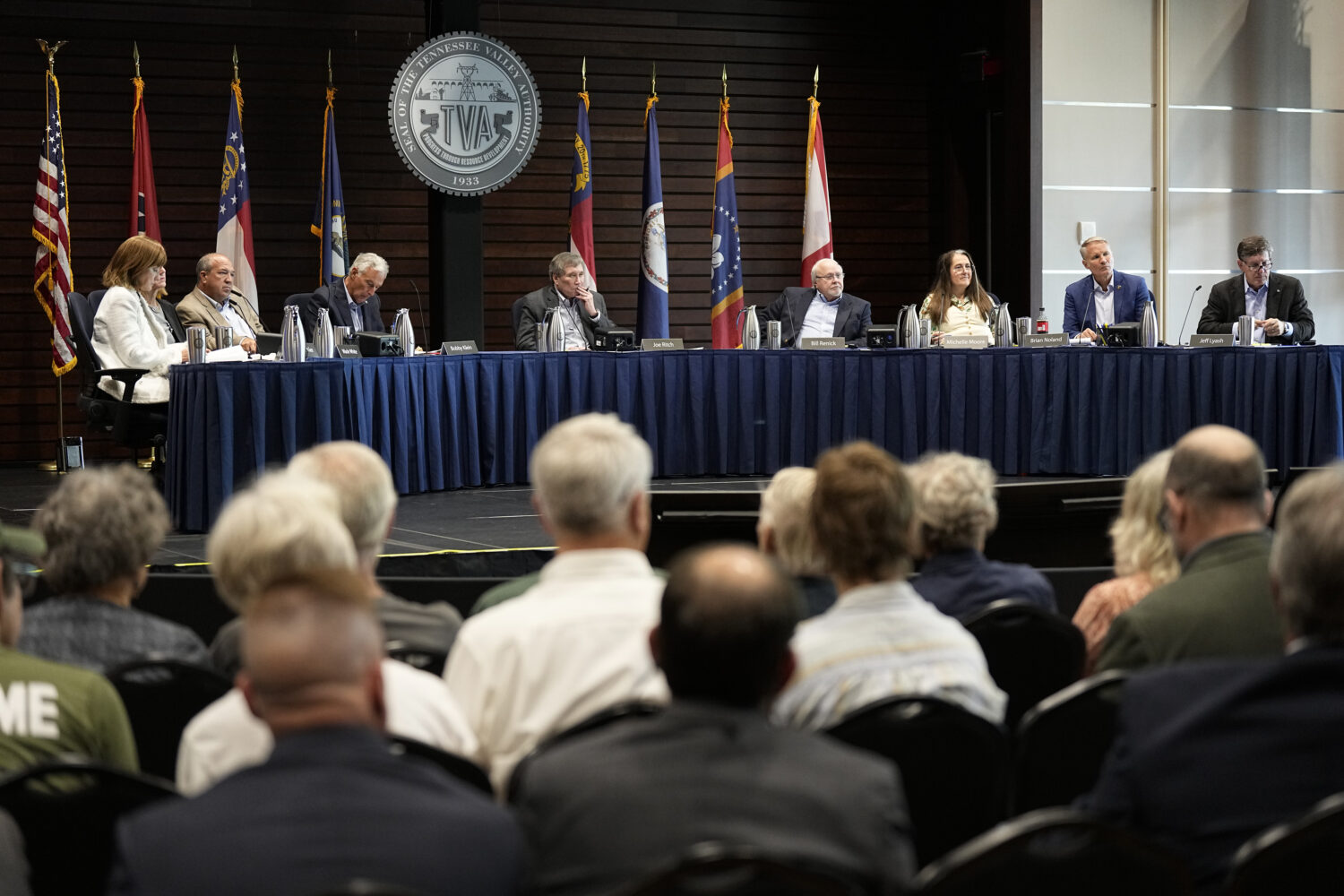 FILE - Members of the Tennessee Valley Authority Board of Directors listen to members of the public...