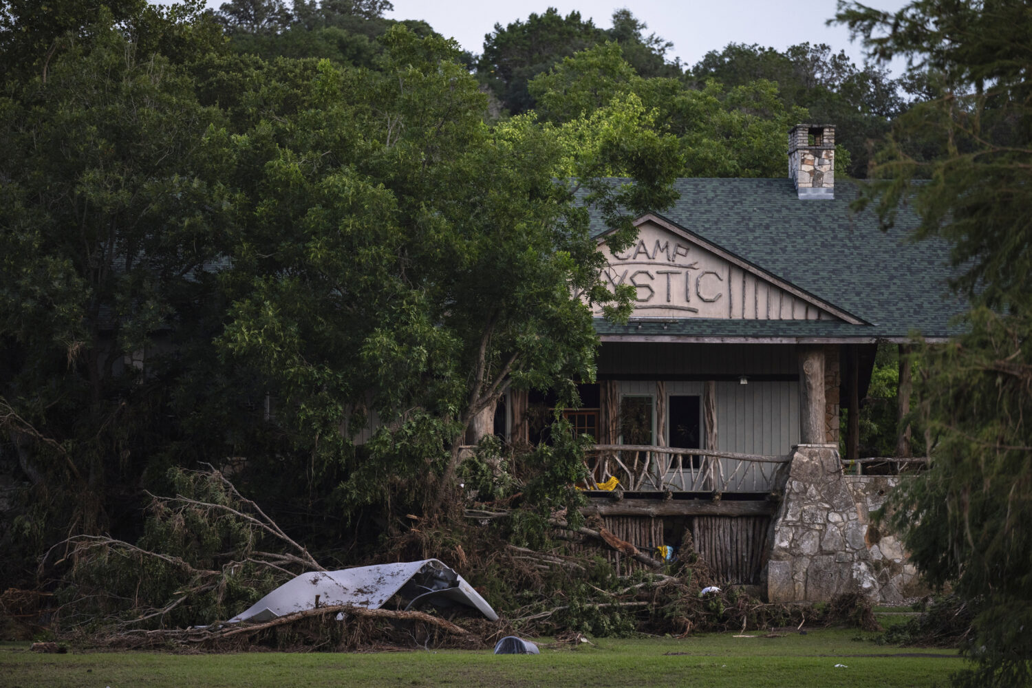 FILE - Debris covers the area of Camp Mystic in Hunt, Texas, Monday, July 7, 2025, after a flash fl...