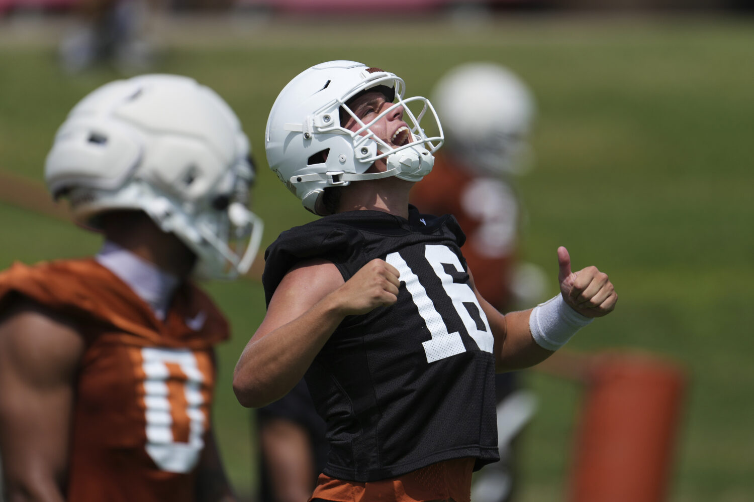 Texas quarterback Arch Manning (16) reacts during an NCAA college football practice in Austin, Texa...